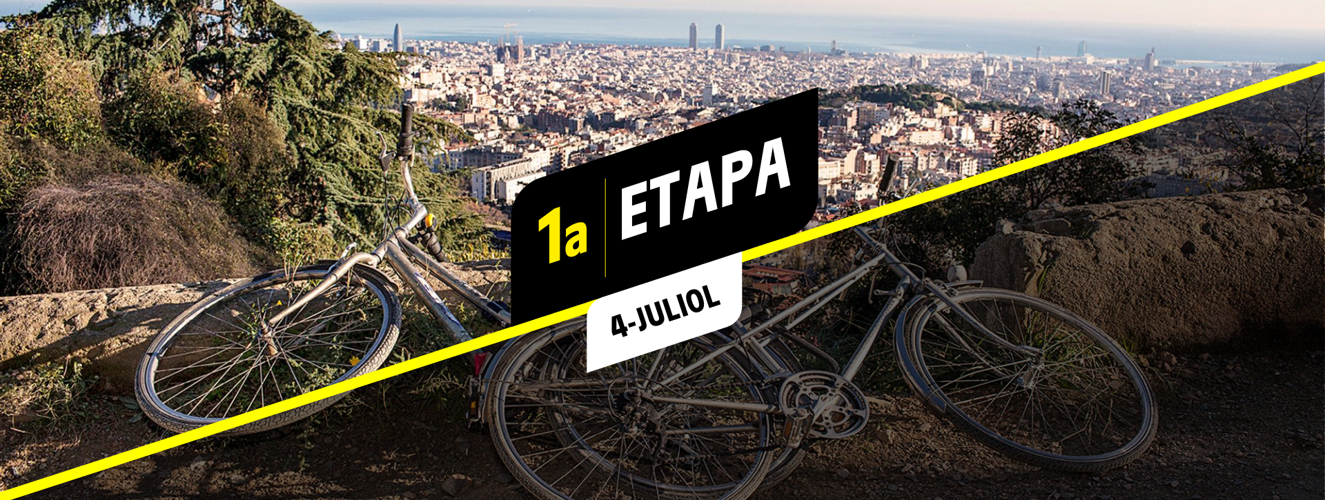 Bicicletes a la vora d'un camí a la muntanya amb vistes sobre Barcelona. Autoria: Paola de Grenet Bicicletes a la vora d'un camí a la muntanya amb vistes sobre Barcelona. Autoria: Paola de Grenet
